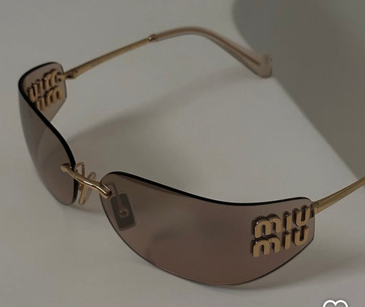 Miu Miu MU A51S 5AK20P Gold